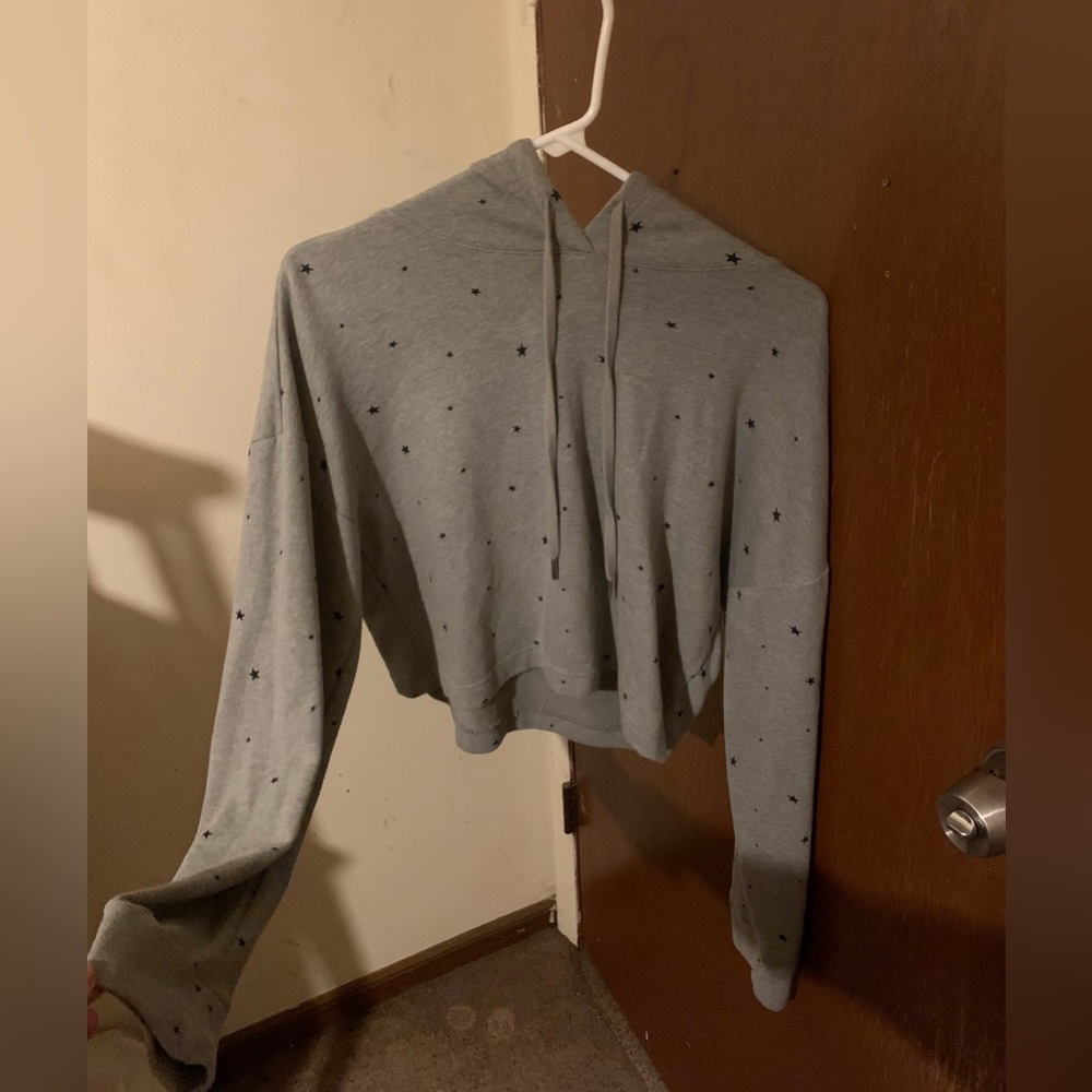 Gray crop top hoodie with black stars